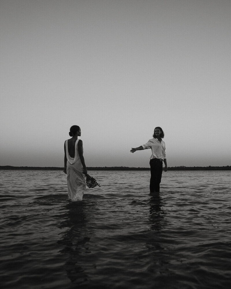 couple in the lake, black and white