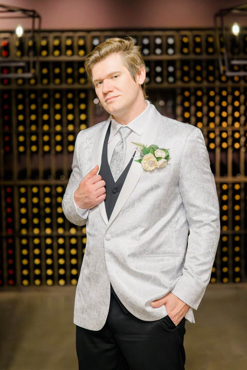 Groom doing a post before his wedding recemony
