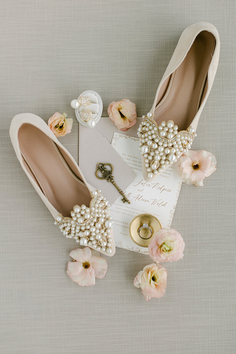 Mocha linen mat styled with brown and neutral wedding paper goods