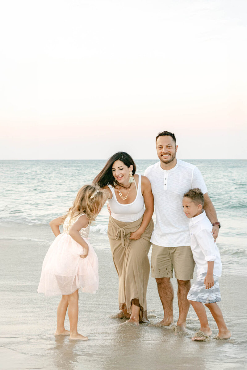 A family photo on the beach taken by the Outer Banks photographers 