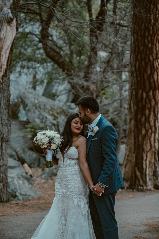 bride and groom at lower yosemite falls trail