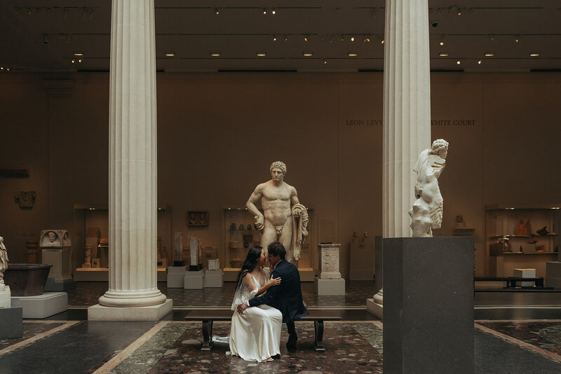 bride and groom kissing at the met before eloping shot by Elsie Goodman Photography | NYC Elopement Packages