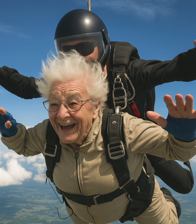 Elderly lady skydiving to demonstrating you can be young at heart at any age