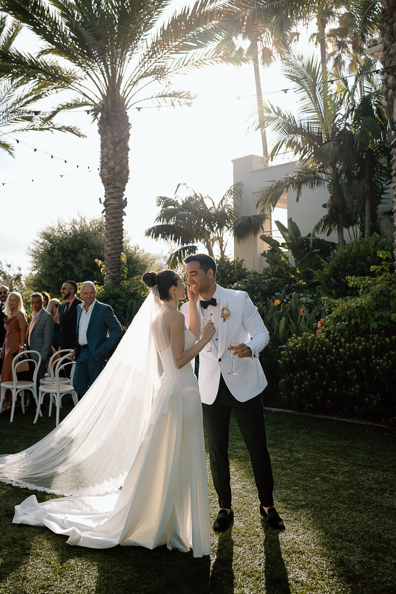 couple standing in front of reception