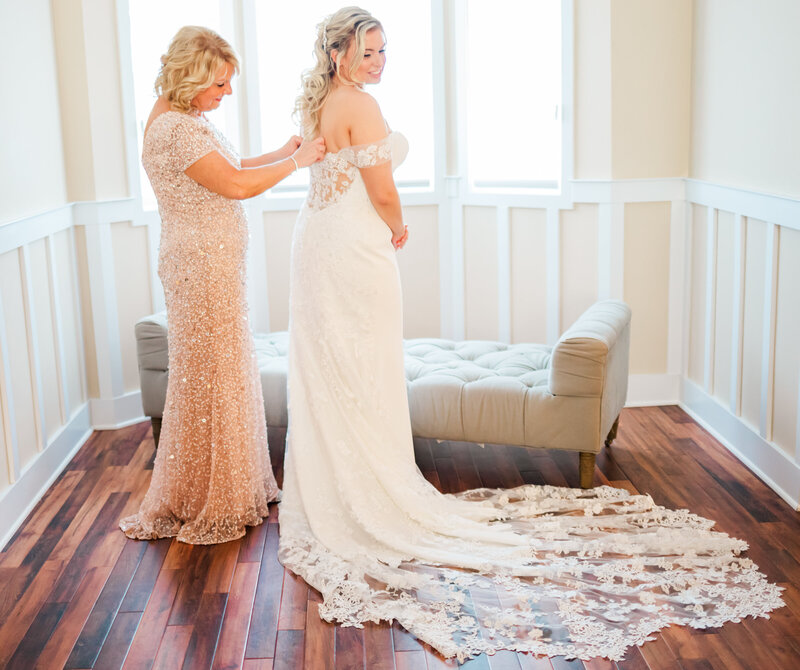 Bride and her mother having a moment before the wedding