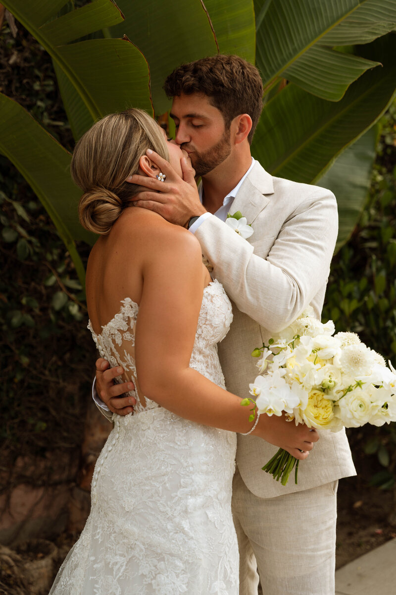 bride and groom kissing