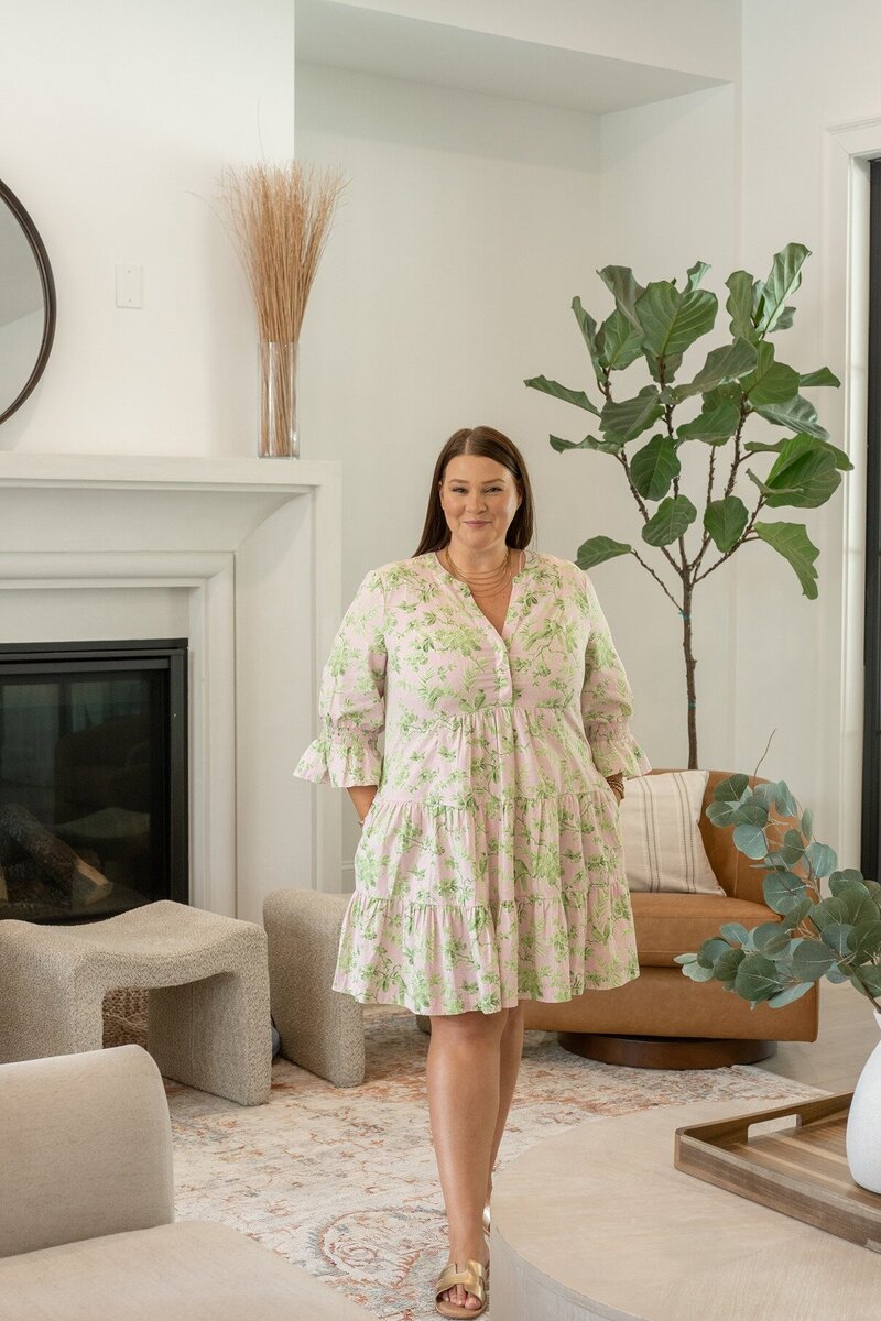 Thoughtful home staging details like pillows, florals, and ambient lighting