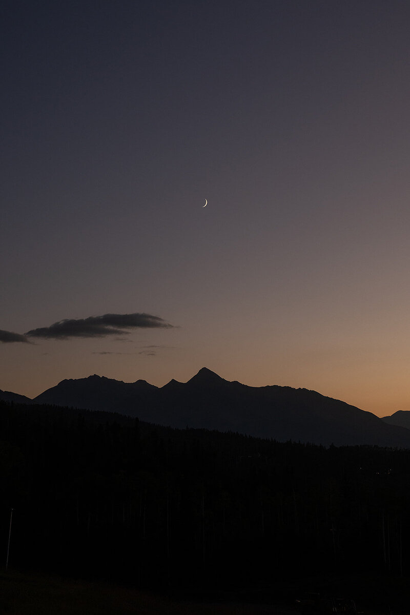 moon rising over san juan mountains in telluride
