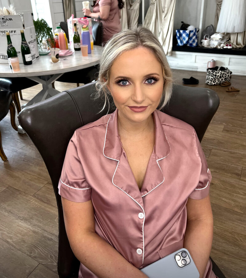 Soft, natural bridal makeup applied by a Houston makeup artist, enhancing the beauty of a Houston bride-to-be at a wedding.