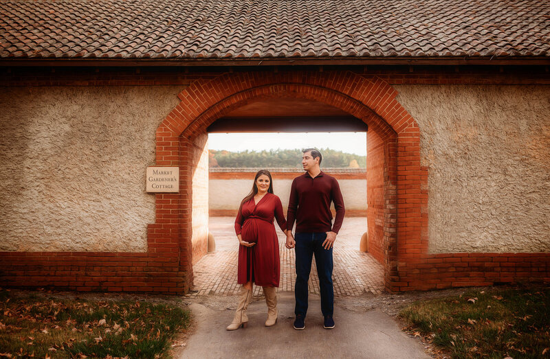 Family Poses with their Infant during Newborn Photoshoot in Asheville, NC.