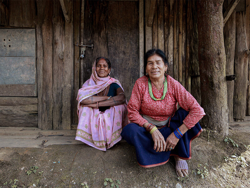 poor women looking at the camera