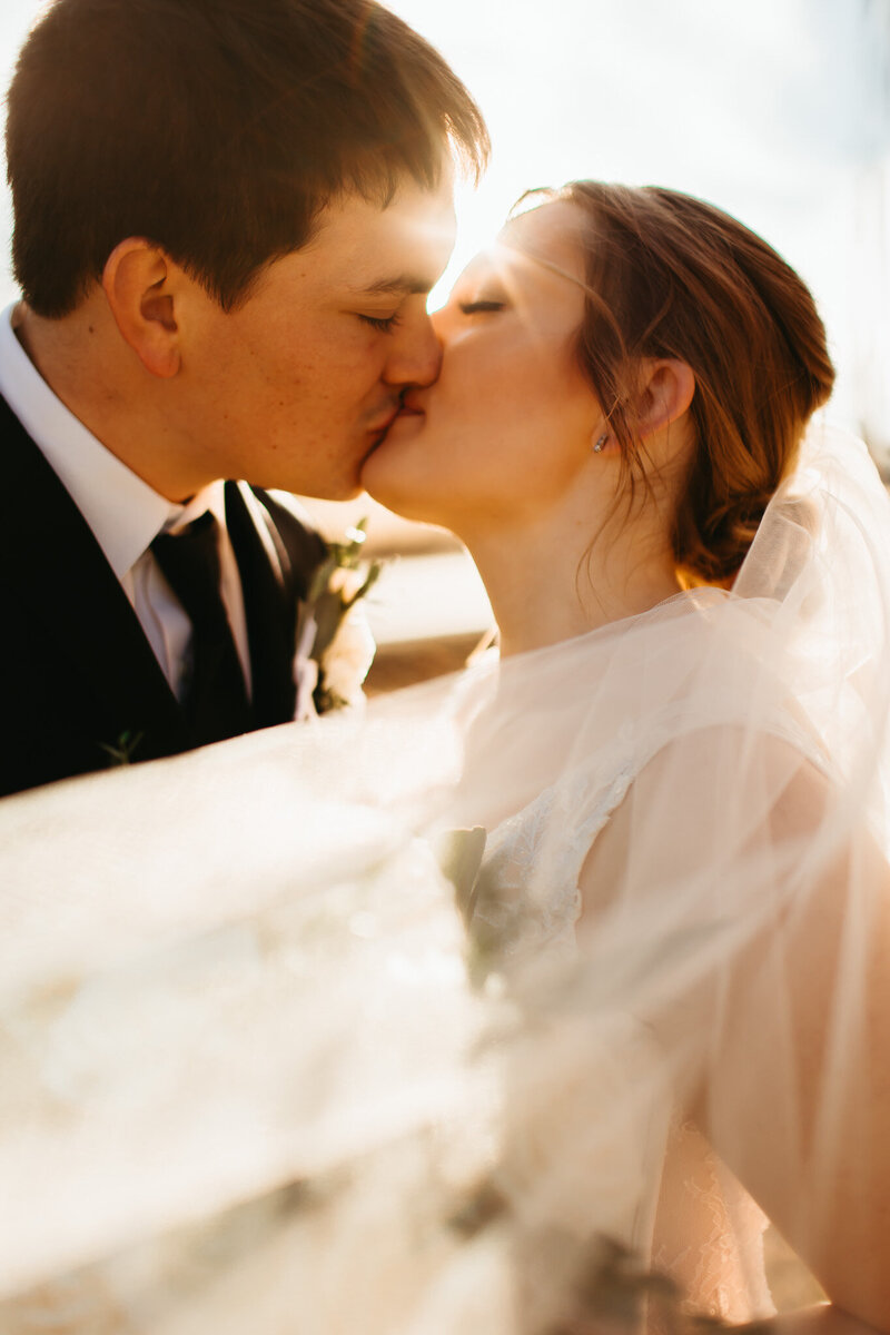 Couple is having bridal portraits before their ceremony at the Meridian Center in Newton Kansas - Ashley Cole Photography