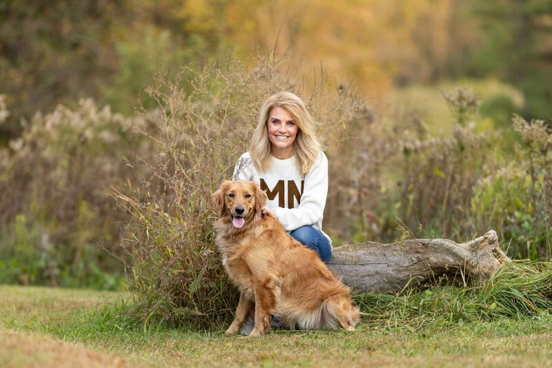 blond woman with a golden retriever in southeast minnesota