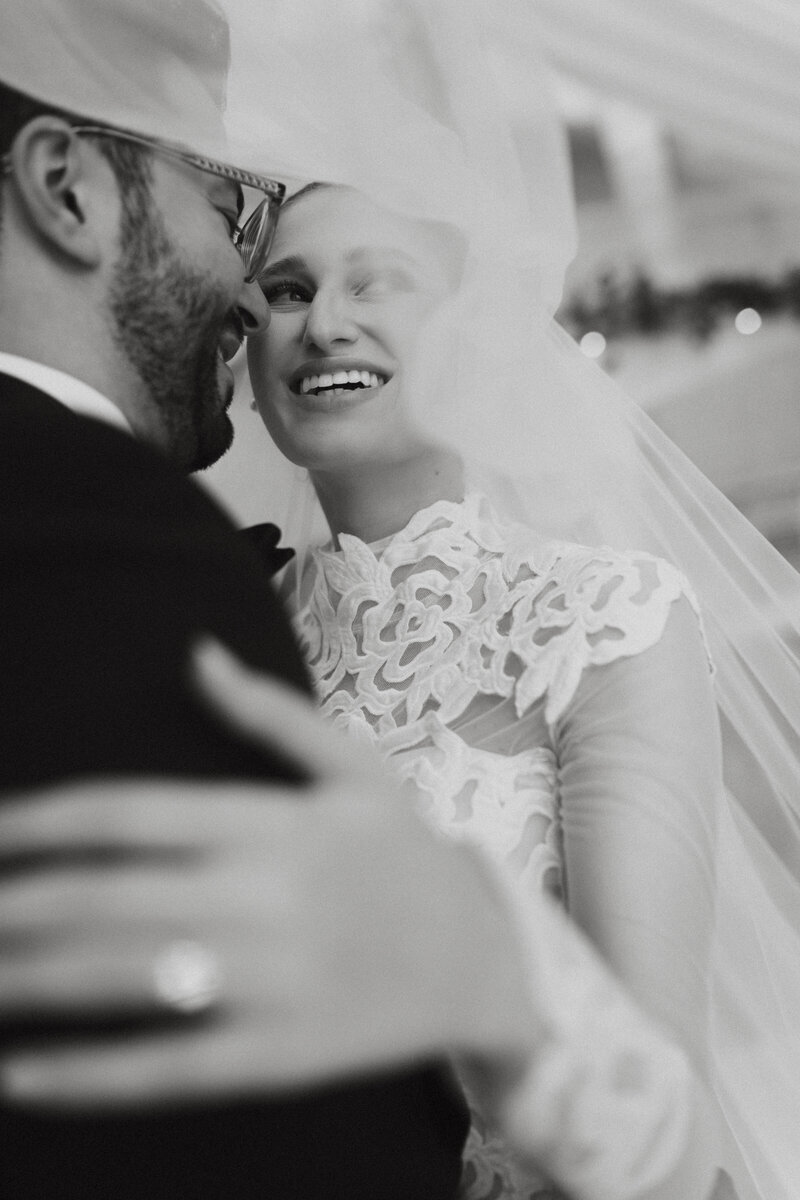 black and white photo of bride photographed from behind