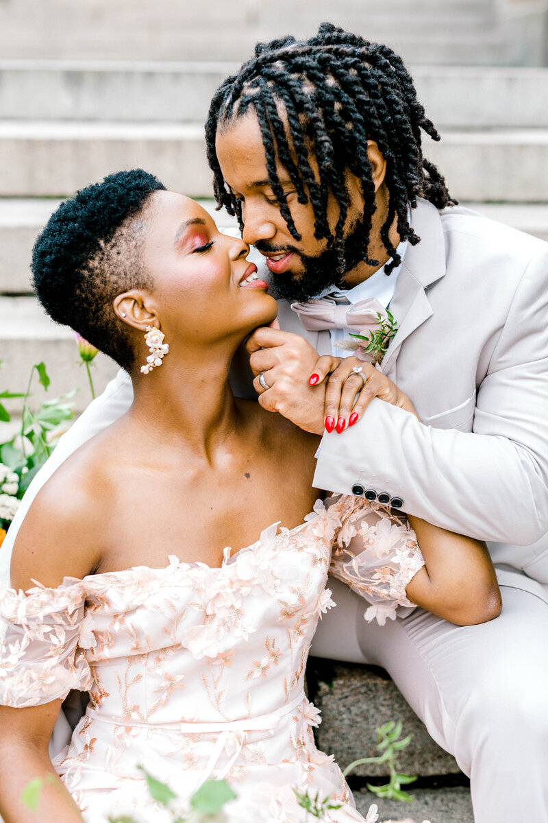 african american wedding couple poses