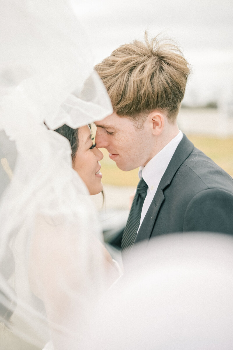 The Nest at Ruth Farms Wedding Venue | DFW Wedding Photographer Rae De Lain Light and Airy | Bride and groom close together