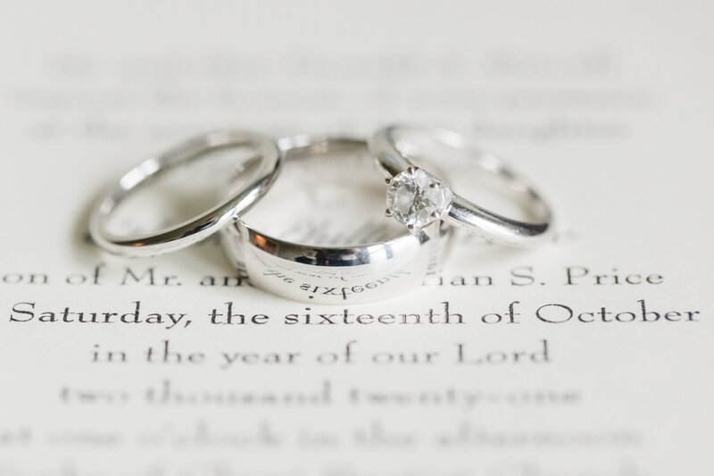 Wedding Rings sitting on a bible at the Posey Meadows Wedding Venue in San Marcos, Texas.