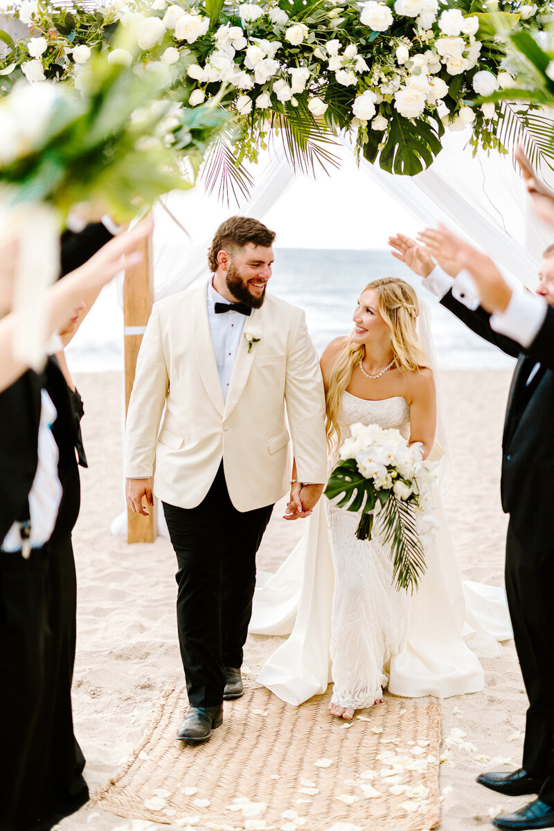 Experience Courtney and Tony's stunning Puerto Vallarta destination wedding filled with tropical florals, ocean views, and timeless style. A luxury Mexico wedding celebration beautifully captured with vibrant, true-to-life photography.

