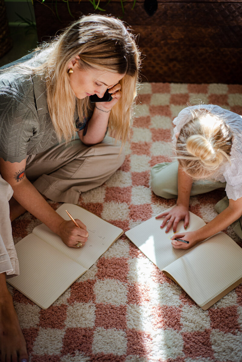 Cozy Sunlit Room with a woman and a child, writing