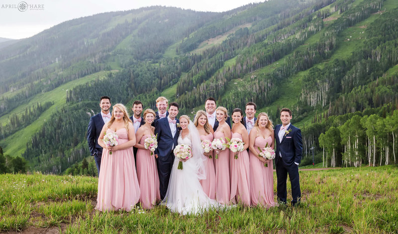 Wedding party formal portrait with beautiful Steamboat Springs Ski Resort Backdrop in Colorado