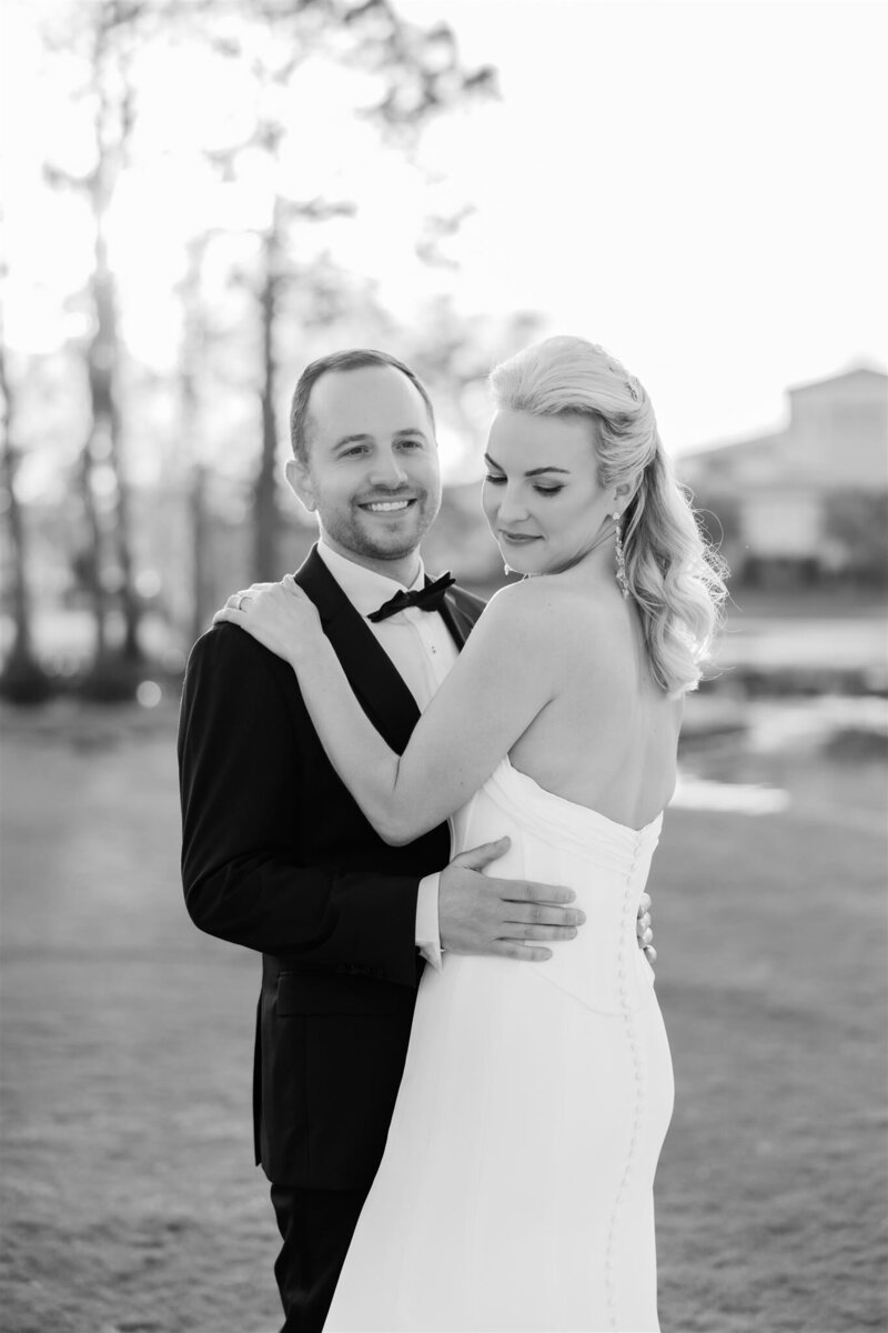Bride and Groom Portrait on a golf course at the Country Club of Orlando by Orlando wedding photographer