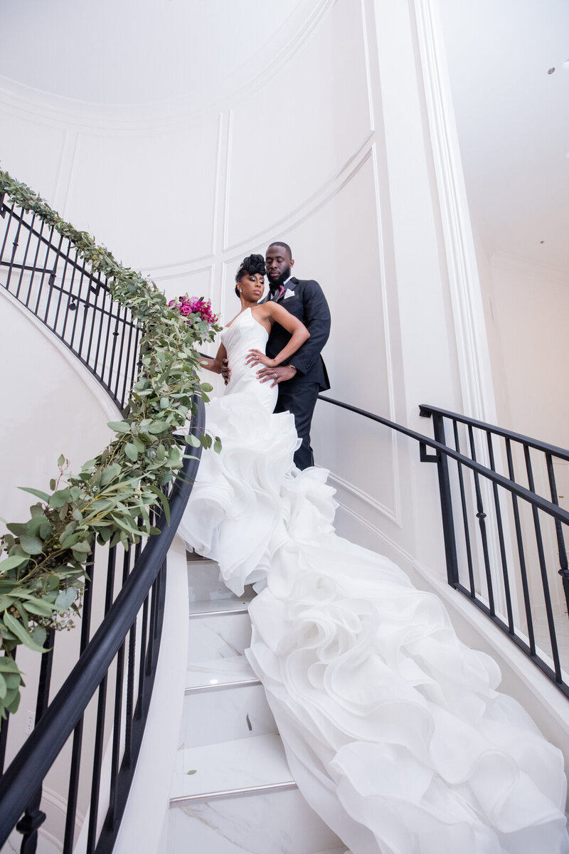 Swank Soiree Dallas Wedding Planner JacqueRae & Rashard - Bride and Groom on a grand staircase