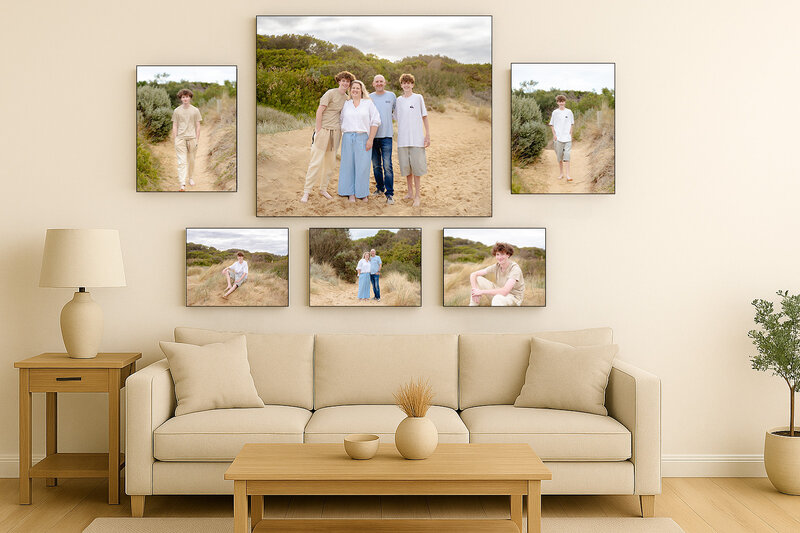 Modern family photo wall display featuring warm, natural portraits in a coastal bushland setting. A stylish arrangement of canvas prints above a neutral sofa—perfect inspiration for professional family photography sessions in Geelong.