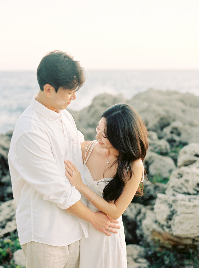 Tim and Amy portrait with the wedding ring, white dress