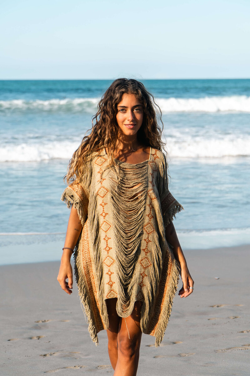 Girl modeling clothes on beach