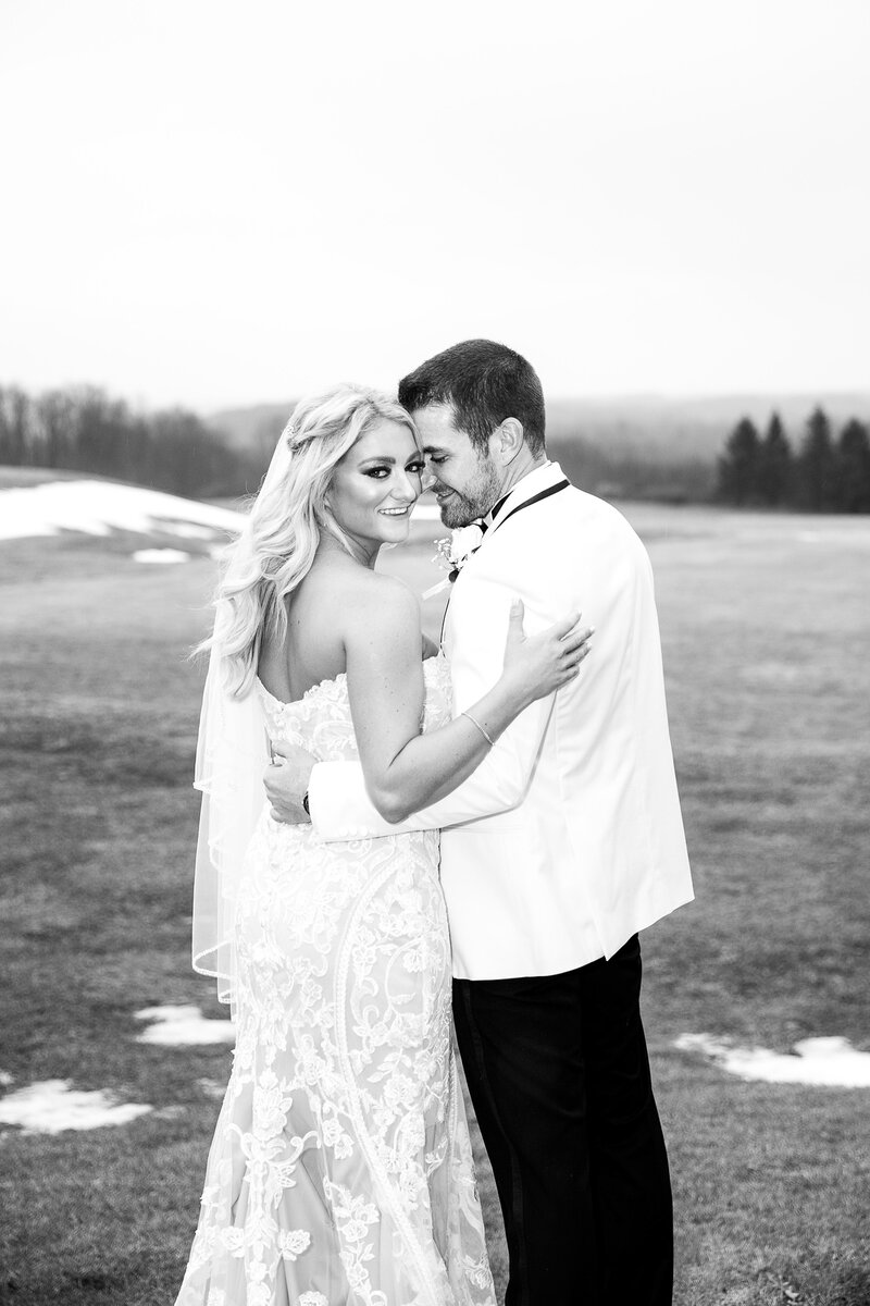 Black and white photo of bride and groom