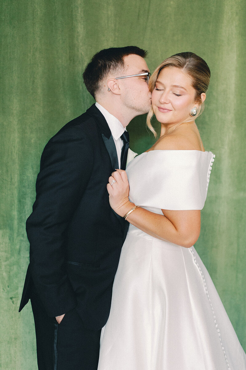 bride and groom kissing