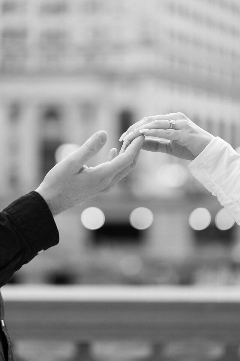 bride and groom holding hands