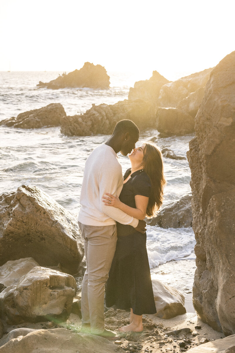 romantic and moody engagement photo on the beach