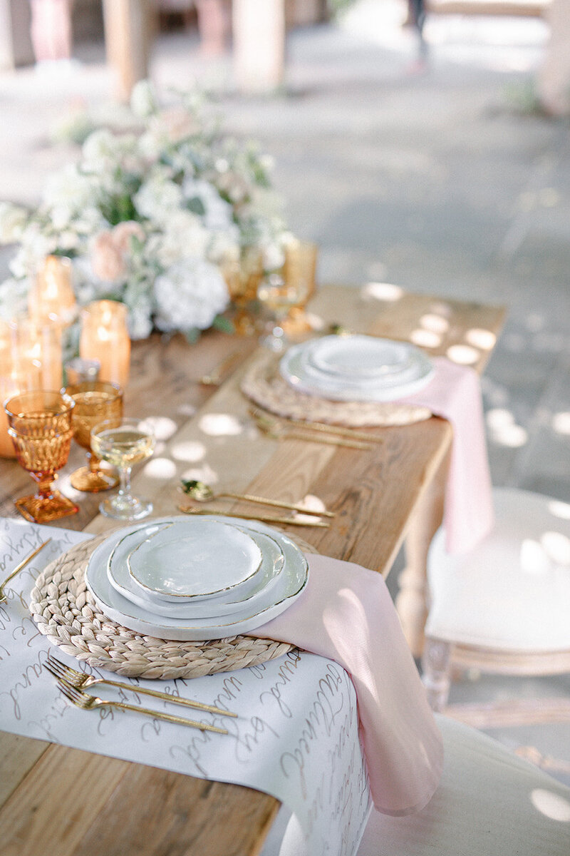 Light and airy florals on a table for a wedding
