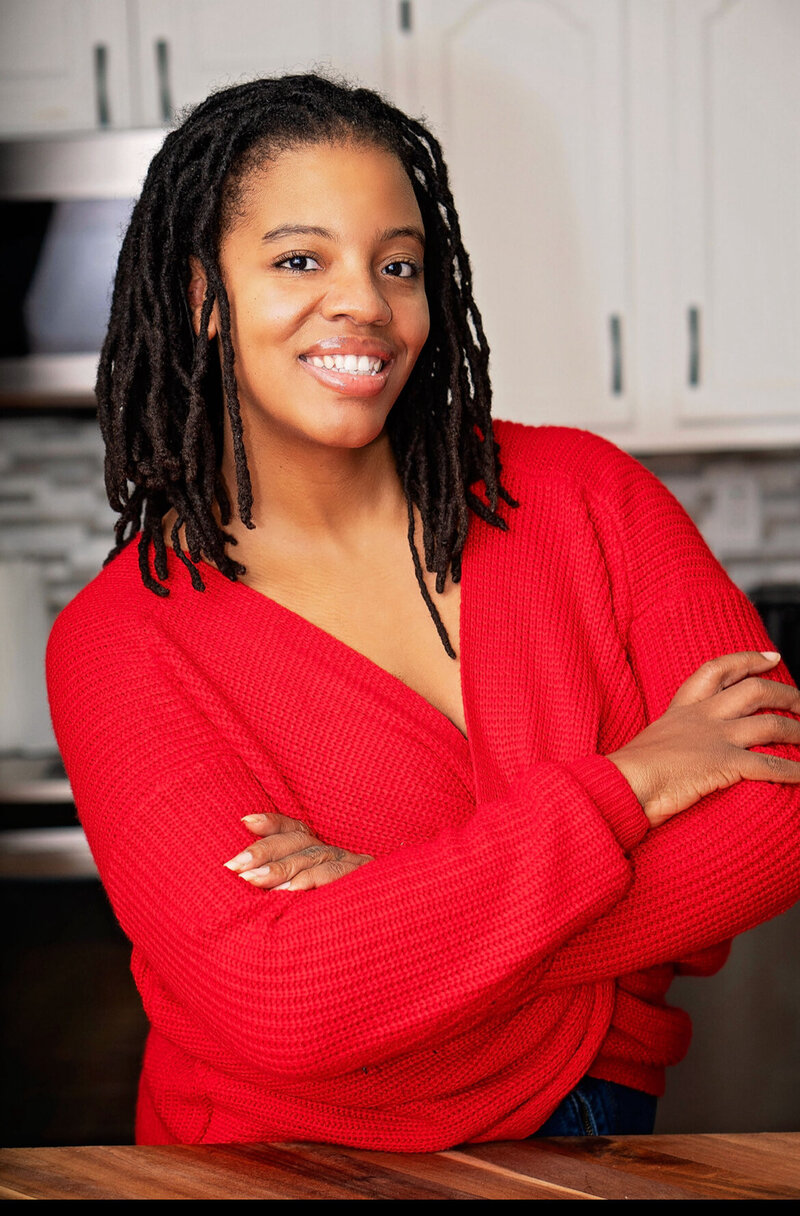 Portrait of a confident Me & She Doula professional.