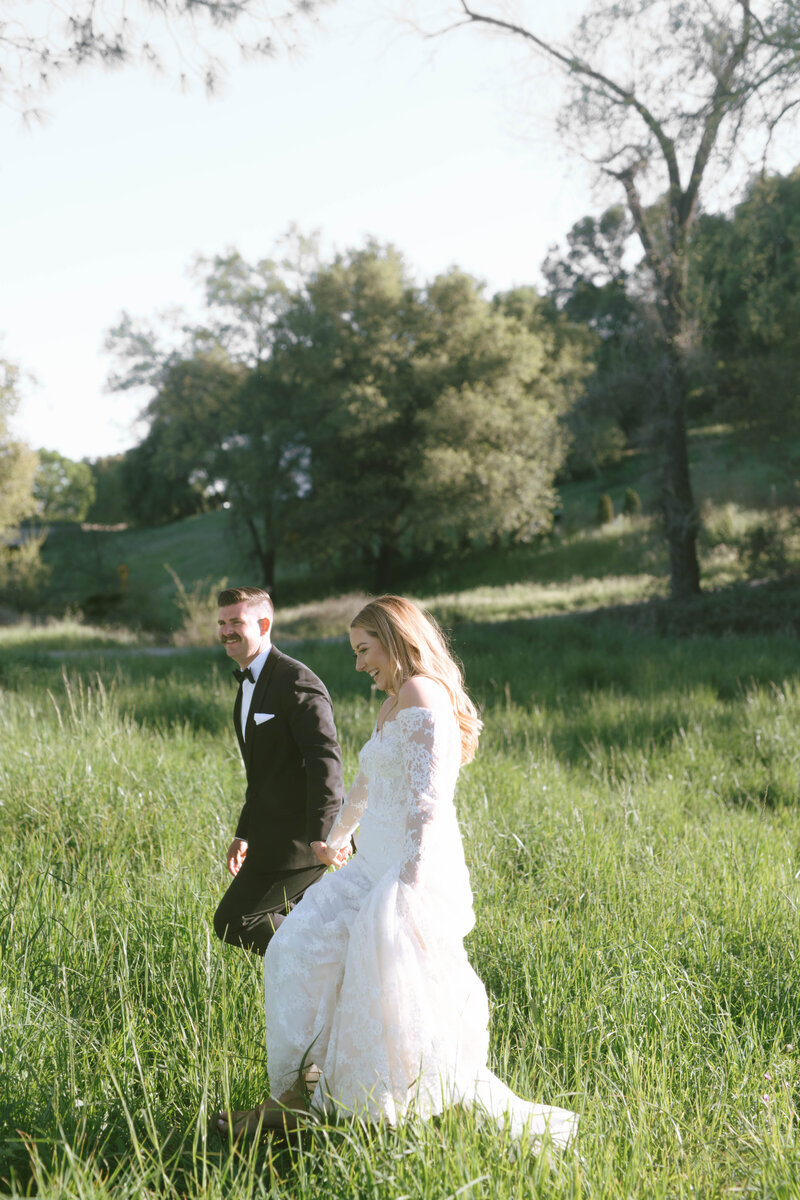 Bride and groom celebrating just married moment during an outdoor wedding ceremony in Seattle, captured by Seattle wedding photographer Rachael Marie Photography