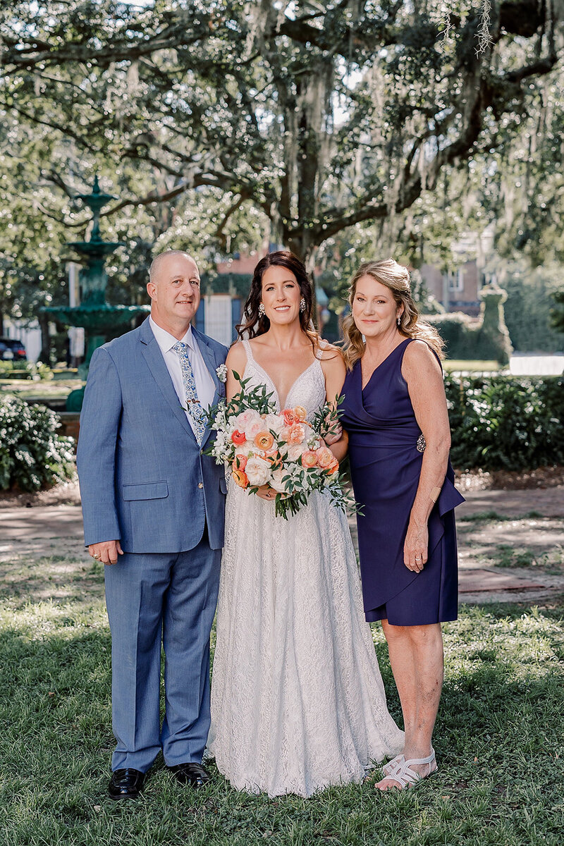 wedding formals portraits blue bride and groom bridesmaids groomsmen flower girl