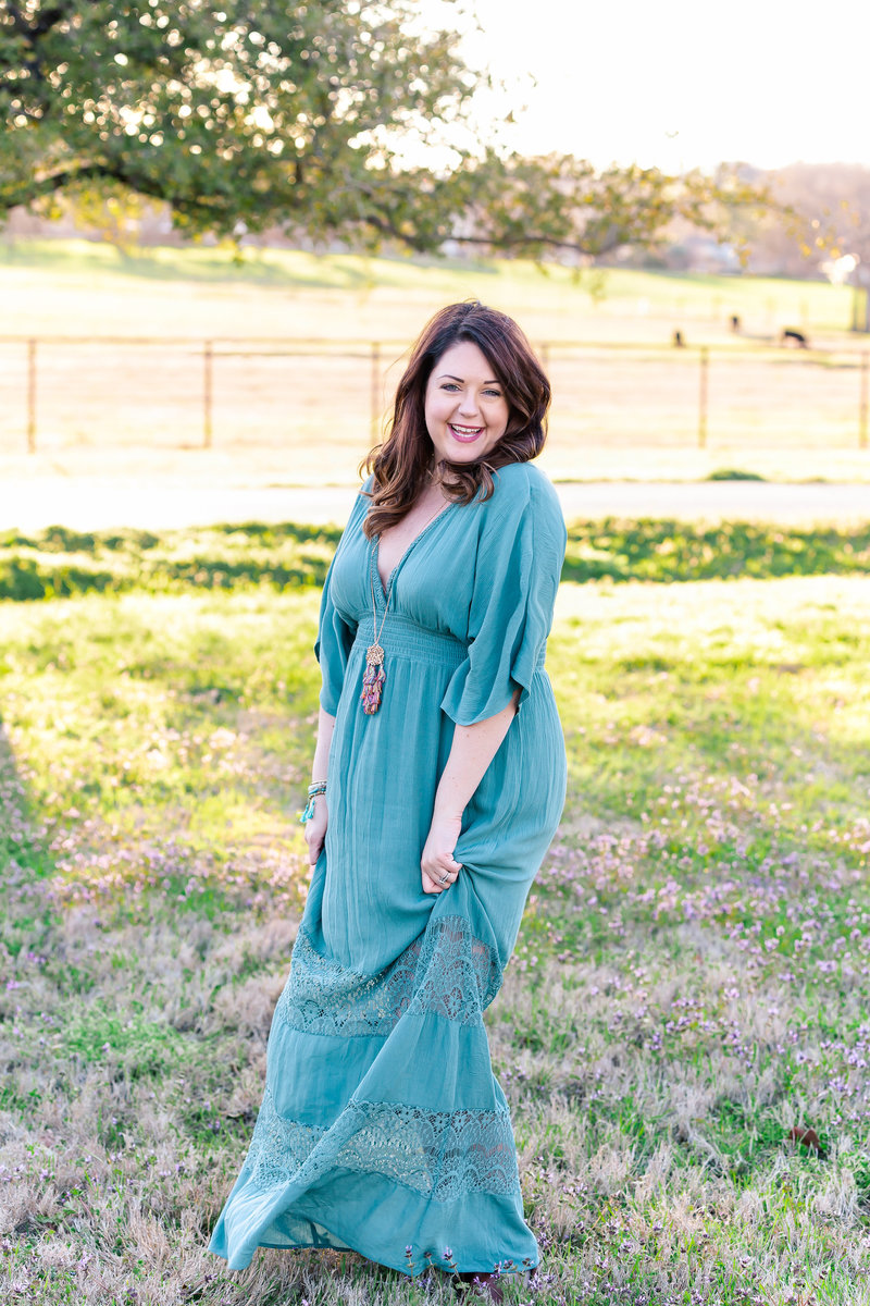 Jill of Jill Blue Photography in Turquoise dress from Versona in a field