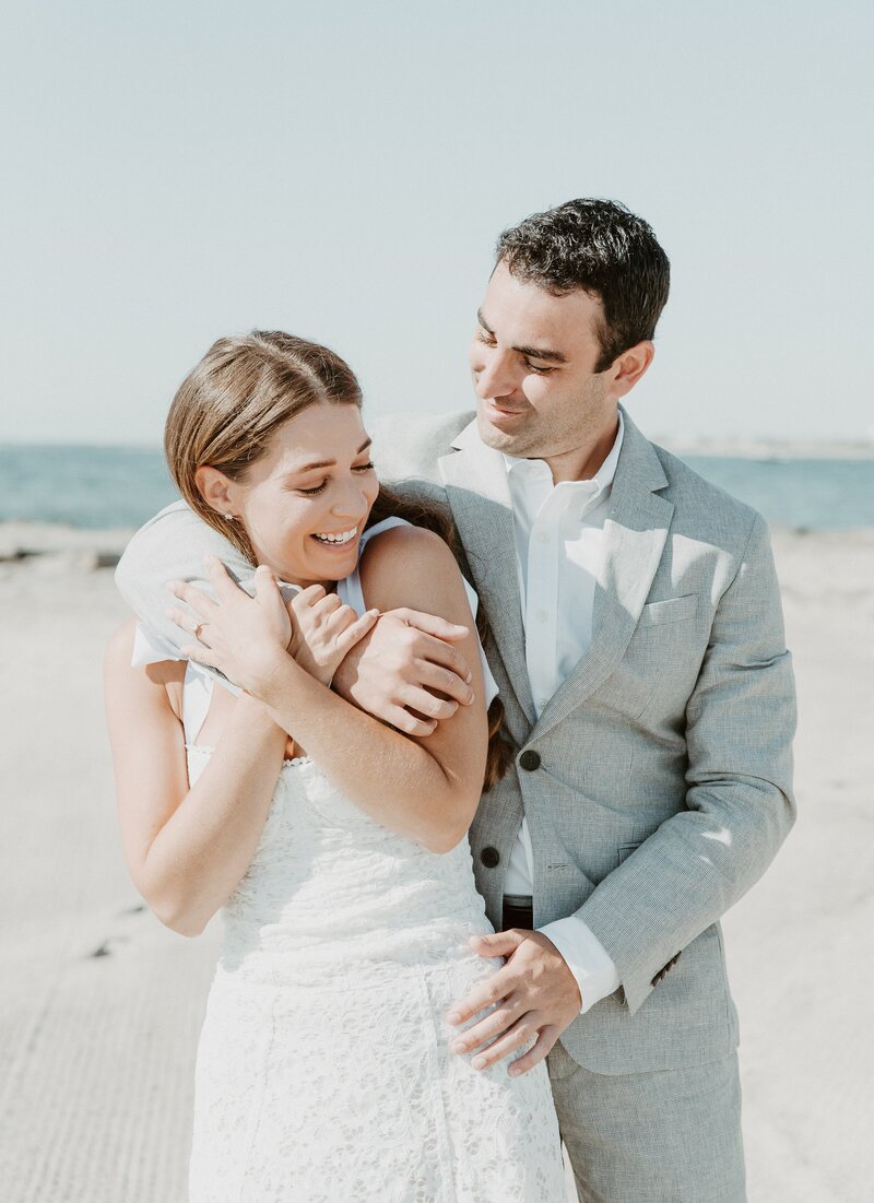 bride and groom on beach in Los Angeles