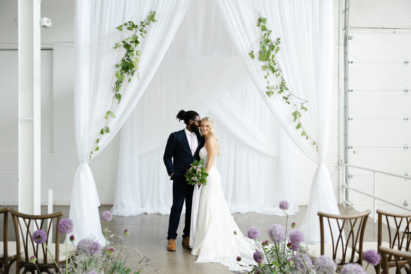 photo of bride and groom in ceremony space