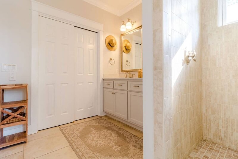 walk in shower and double sink vanity