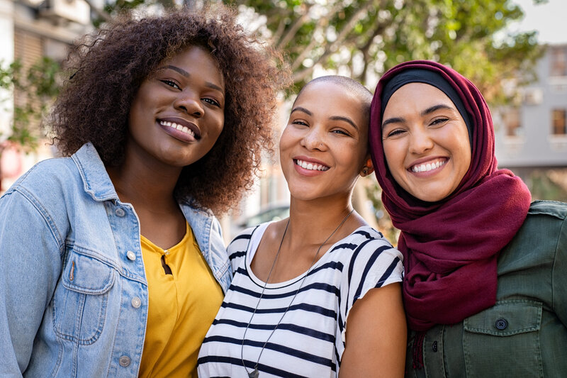 Young adult counseling, three women smiling