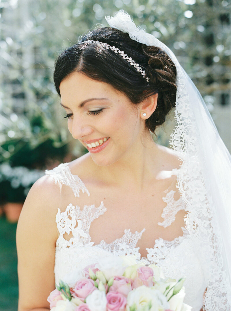 Portrait of the bride outside with the gown