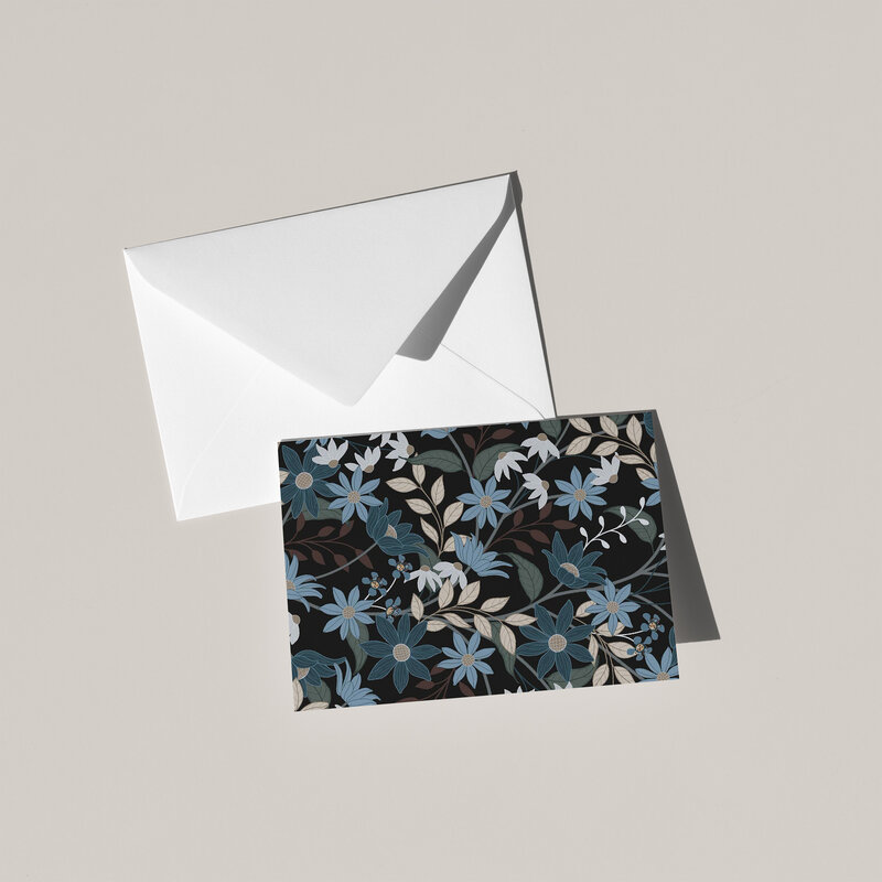 These A6 blank cards are perfect for sending a thoughtful note or simply keeping in your stationery drawer for special moments. Each card showcases a unique hand-drawn design - layered floral scene on a black background - by Green Acre Designs.