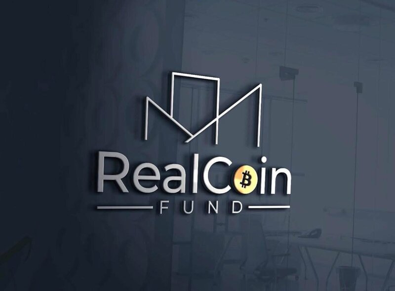 RealCoin Fund logo on a wall