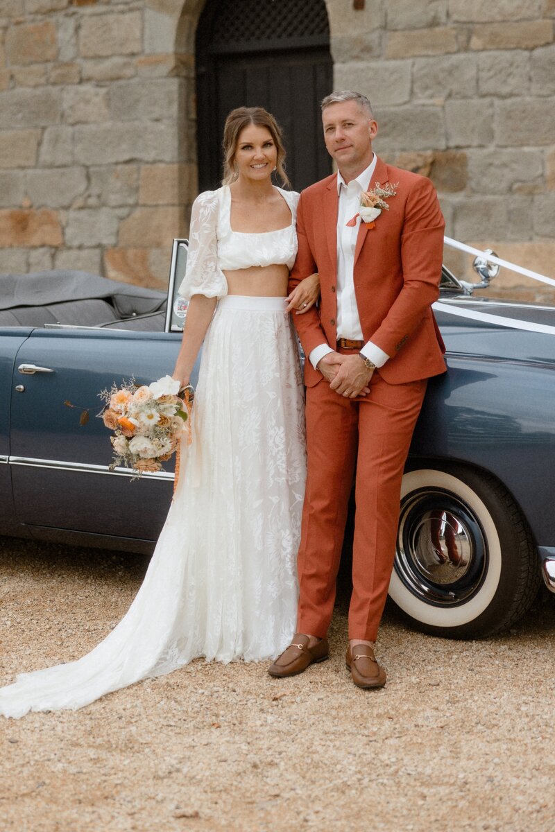 A full length colour portrait of a bride in her wedding dress