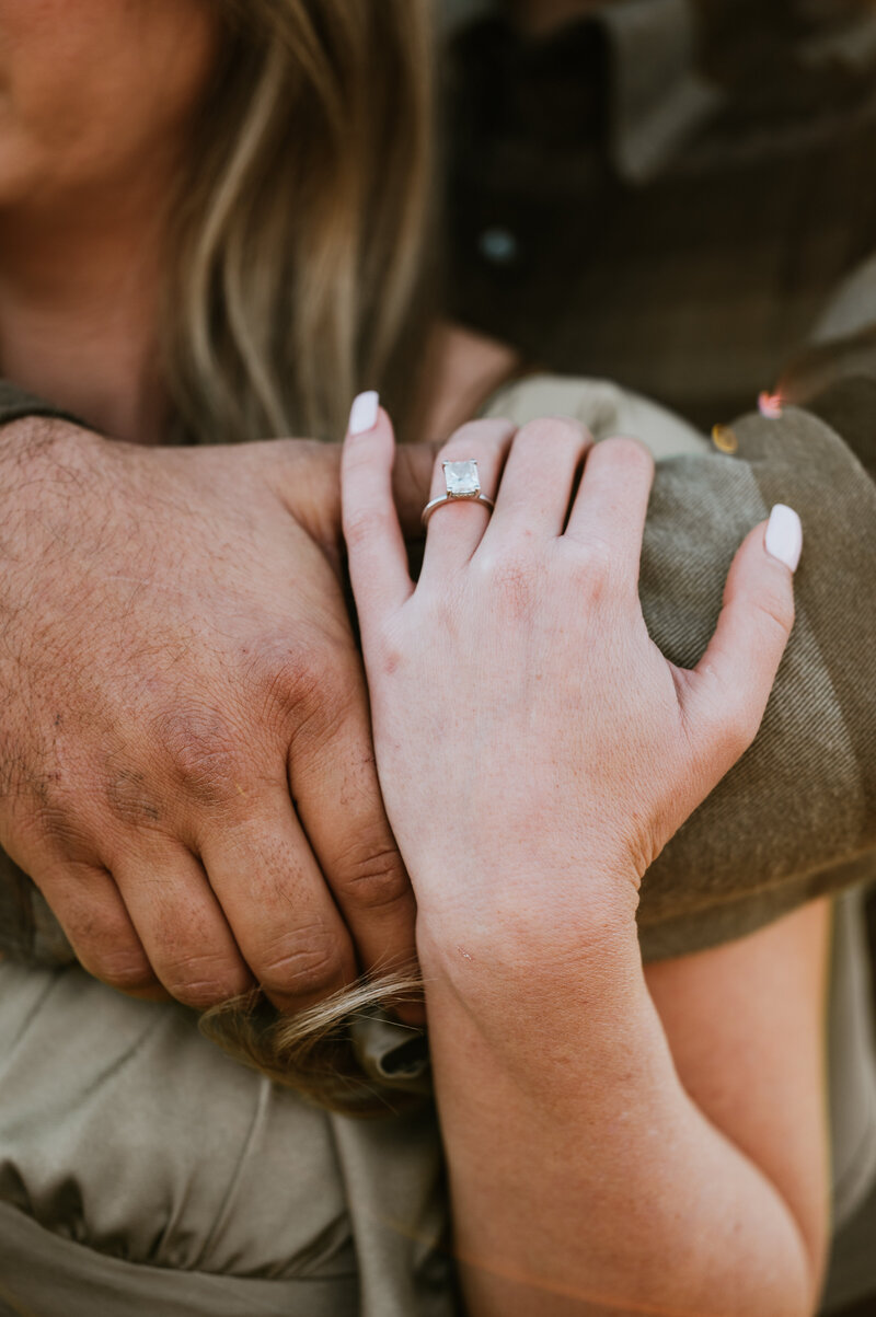 Detail shot of the ring at engagement session. 
