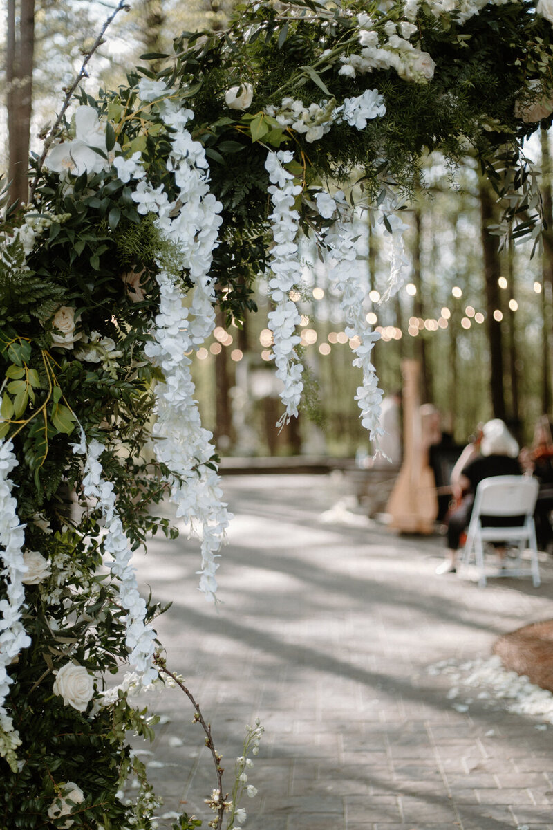 Wedding ceremony arbor for a summer wedding at Hiwassee River Events and Wedding venue.