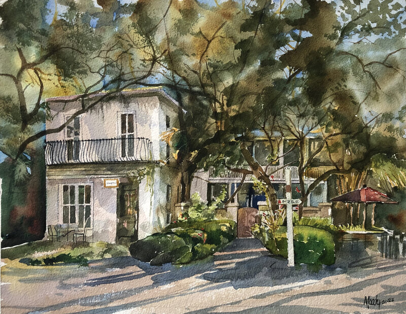 Watercolor of a house with trees surrounding it
