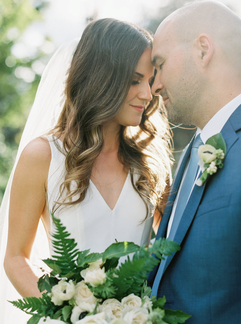 Bride and groom walk up memorial steps at their DC wedding